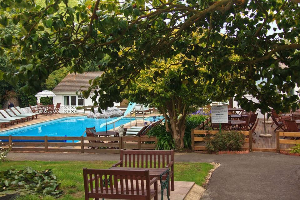 A view of the swimming pool from La Collinette Hotel terrace